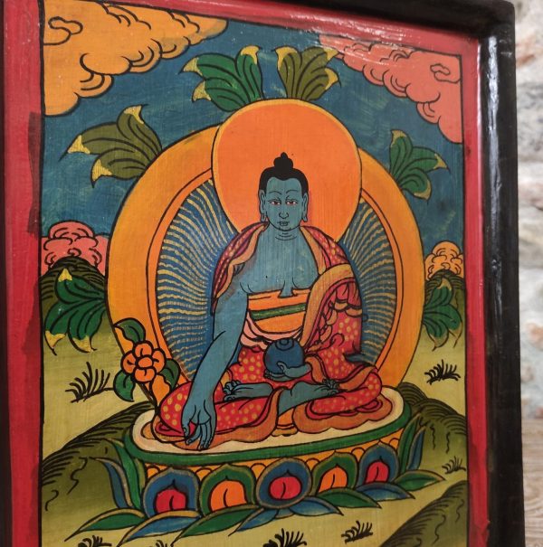 dettaglio di quadro in legno buddha dipinto in blu